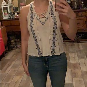 Razor back lace up embroidered shirt.